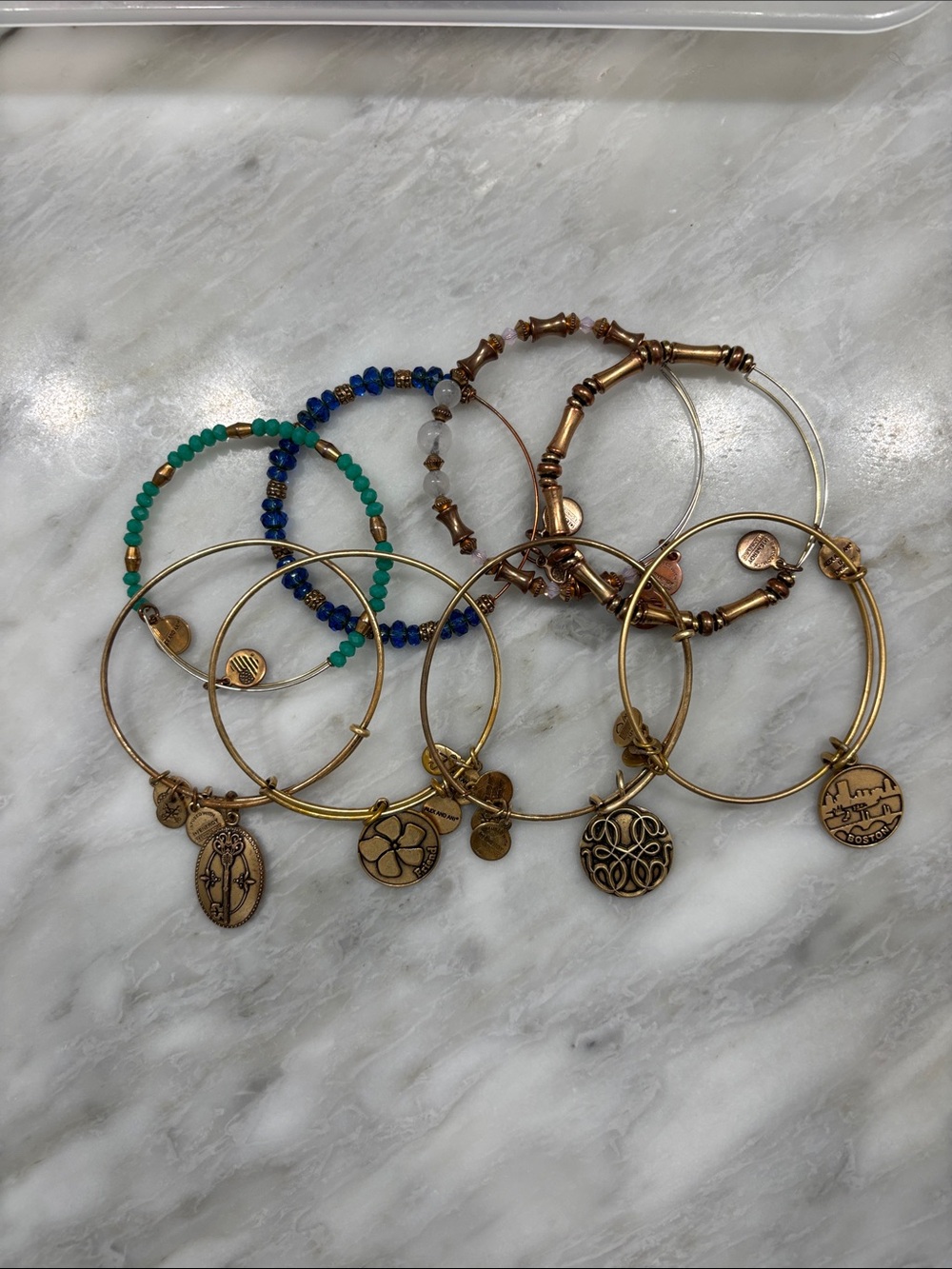 Alex and Ani Gold Charm Bangles
8 bracelets